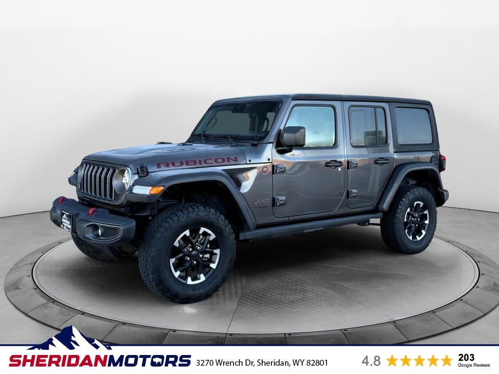 2025 Jeep Wrangler Rubicon in Gray — front three-quarter view
