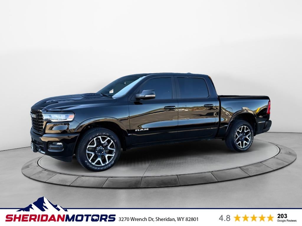 2025 RAM 1500 Laramie in Black — front three-quarter view