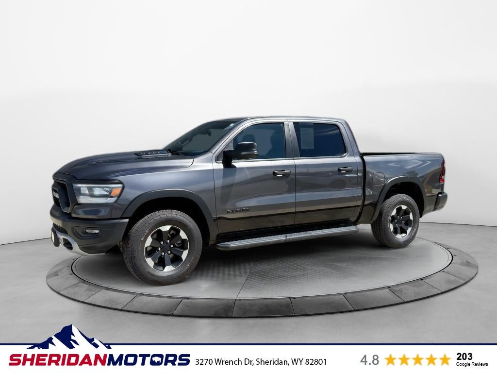2024 RAM 1500 Rebel in Gray — front three-quarter view