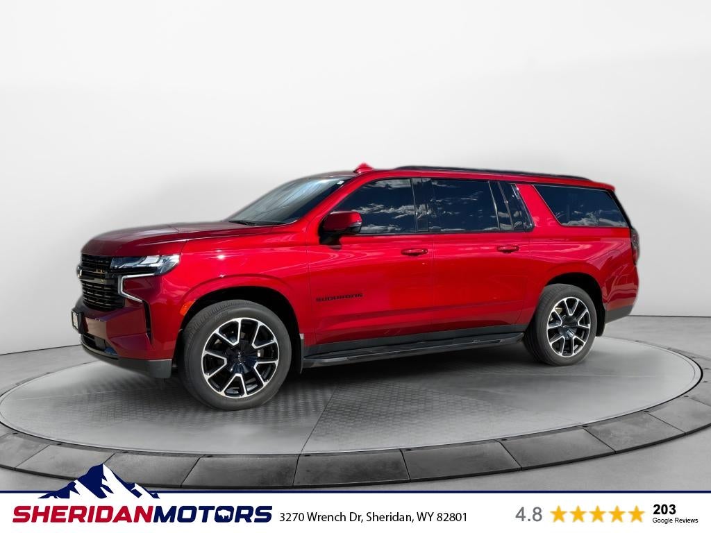 2023 Chevrolet Suburban RST in Radiant Red Tintcoat — front three-quarter view