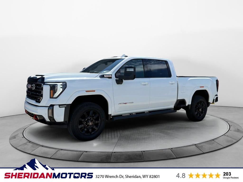 2024 GMC Sierra 2500 HD AT4 in Summit White — front three-quarter view