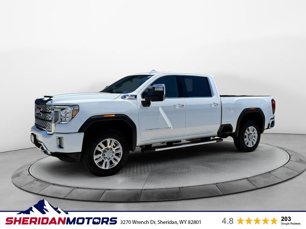 2023 GMC Sierra 2500 HD Denali in Summit White — front three-quarter view